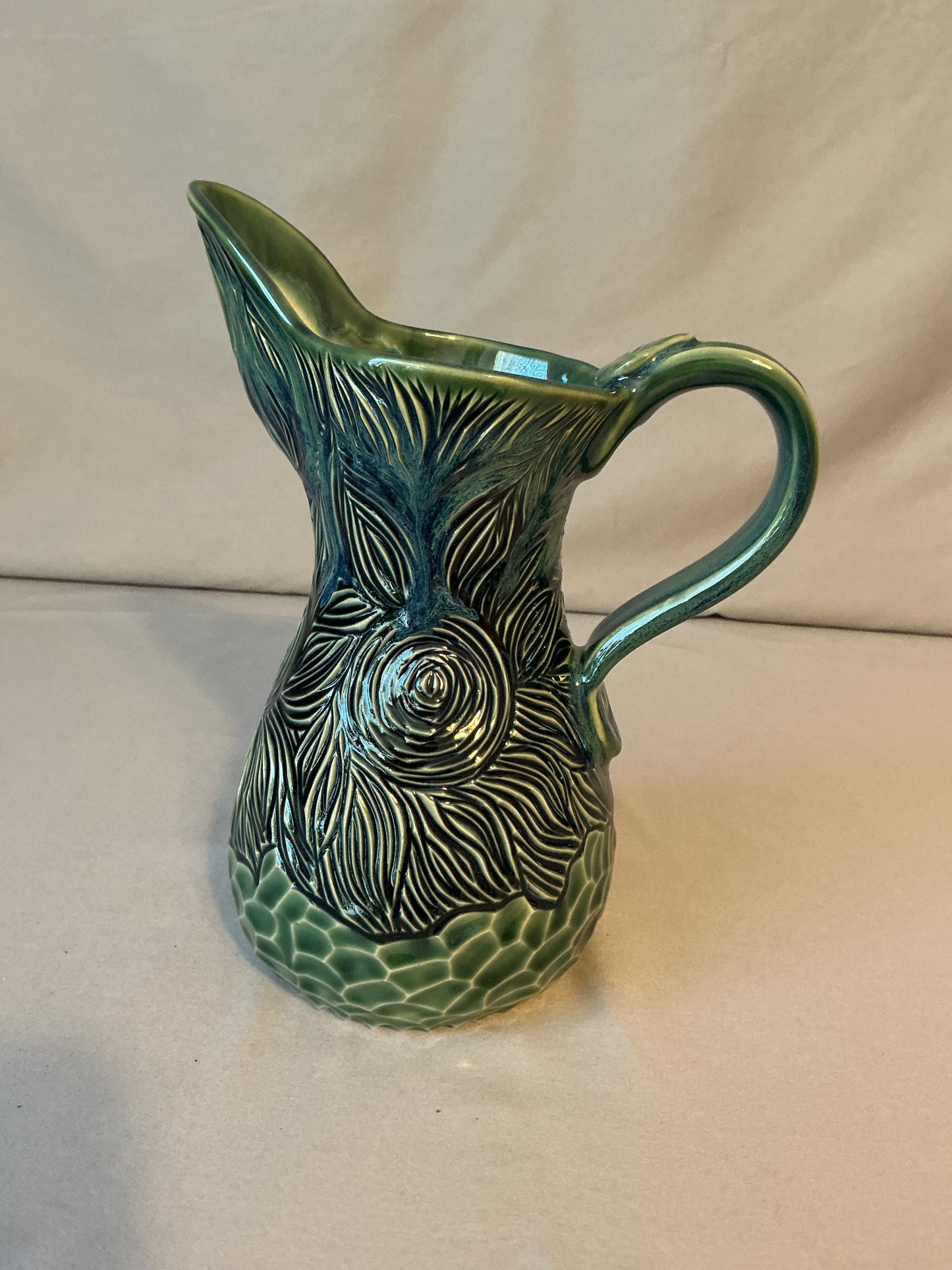 Beautiful Green Carved Pitcher