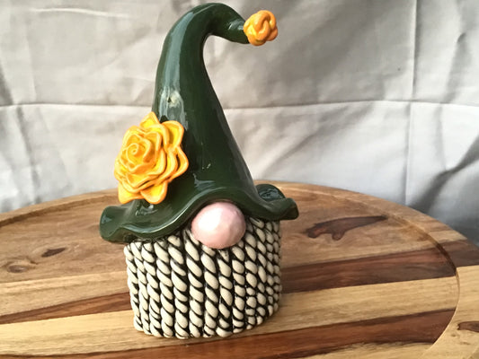 Friendly Nome in Green Hat with Yellow/Orange Rose