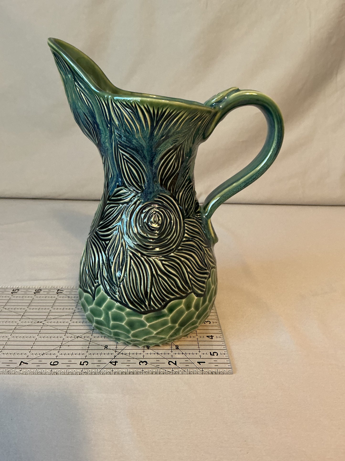 Beautiful Green Carved Pitcher